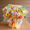 Bó hoa chúc mừng tươi sáng với hoa hướng dương, cúc mẫu đơn, rực rỡ sắc màu từ shop hoa tươi chúc mừng.